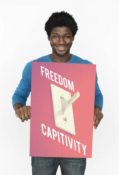 African man holding graphic banner — Stock Photo, Image