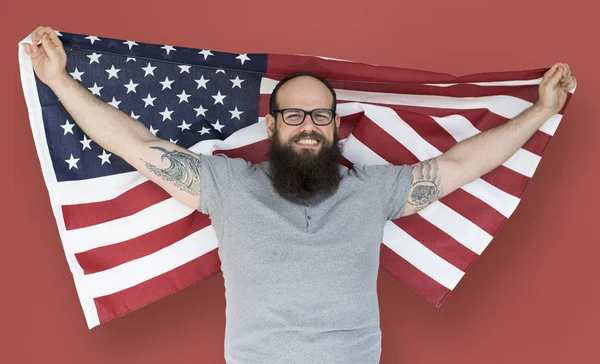 Man holding american flag — Stock Photo, Image