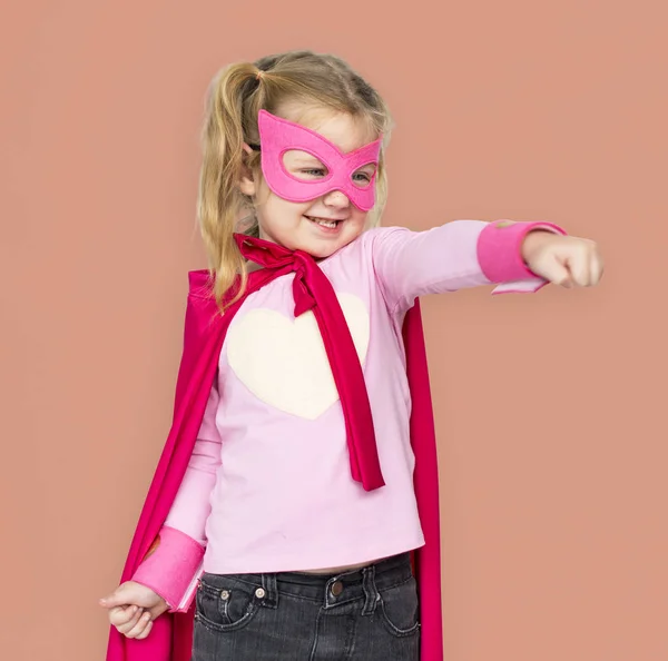 Lille pige i superhelt maske - Stock-foto