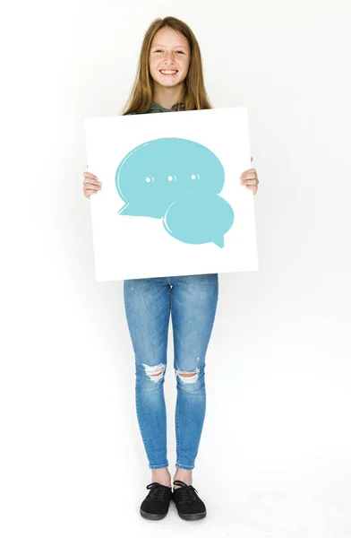 Girl in studio holding placard — Stock Photo, Image