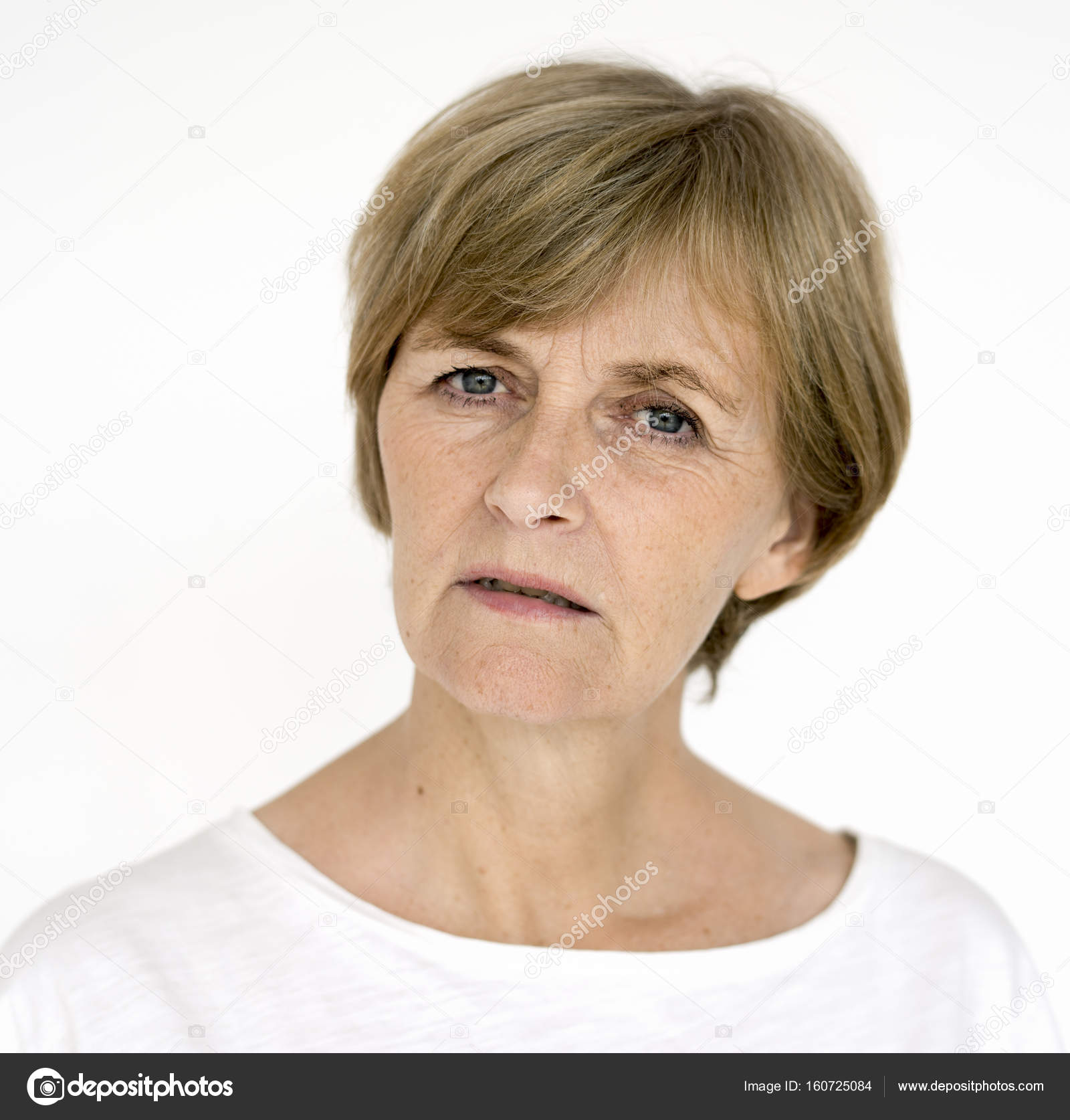 Stuido Portrait Of Serious Senior Woman Stock Photo, Picture and