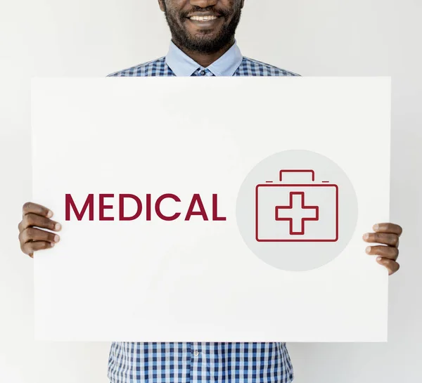 African man showing placard — Stock Photo, Image