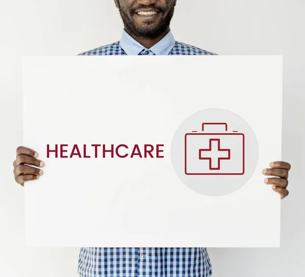 African man showing placard — Stock Photo, Image