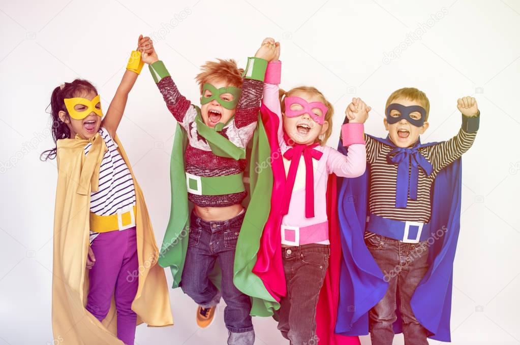 children in super hero costumes