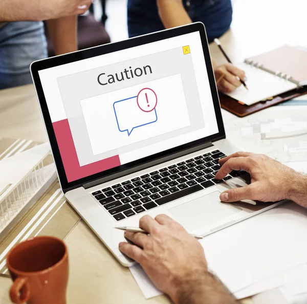 Man using laptop at table — Stock Photo, Image