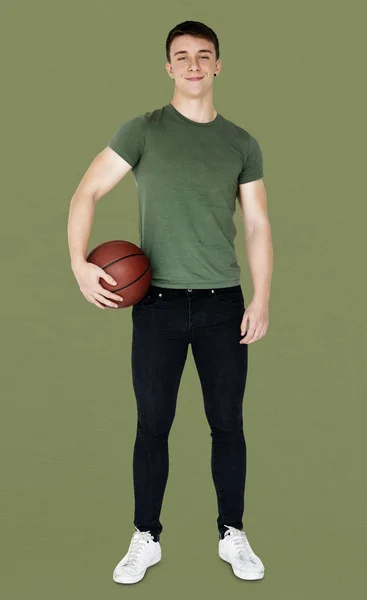 Man holding basketball — Stock Photo, Image