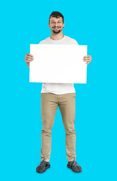 Homem bonito segurando placard em branco — Fotografia de Stock