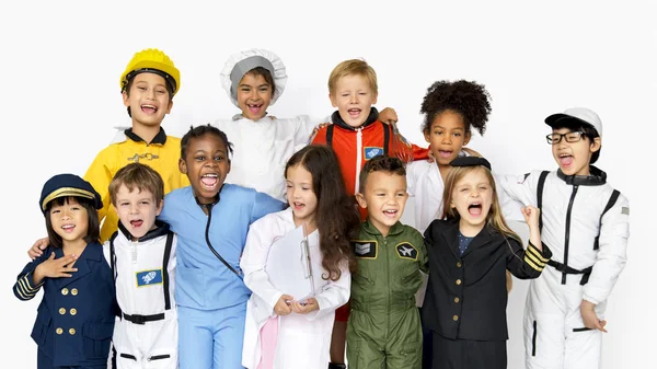 Дети в костюмах различных профессий — стоковое фото