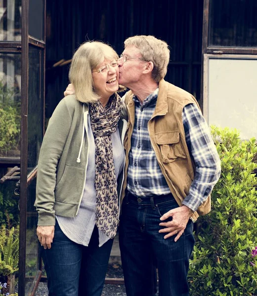 Senior farmer couple kissing