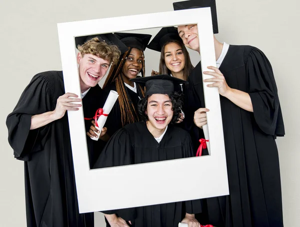 Studentów gospodarstwa Photo Frame — Zdjęcie stockowe