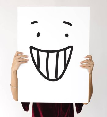 Holding ve afişini gösterilen kişi