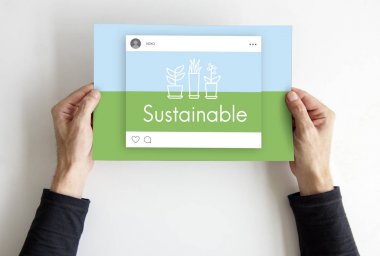 afişini holding eller