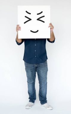 afiş ile gülen yüz tutan adam