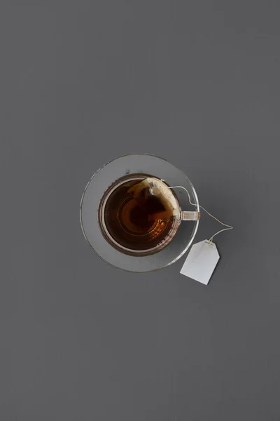 Zwarte hete thee in Beker — Stockfoto