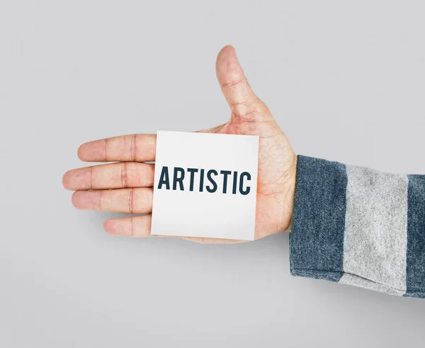 Mão masculina segurando papel nota — Fotografia de Stock