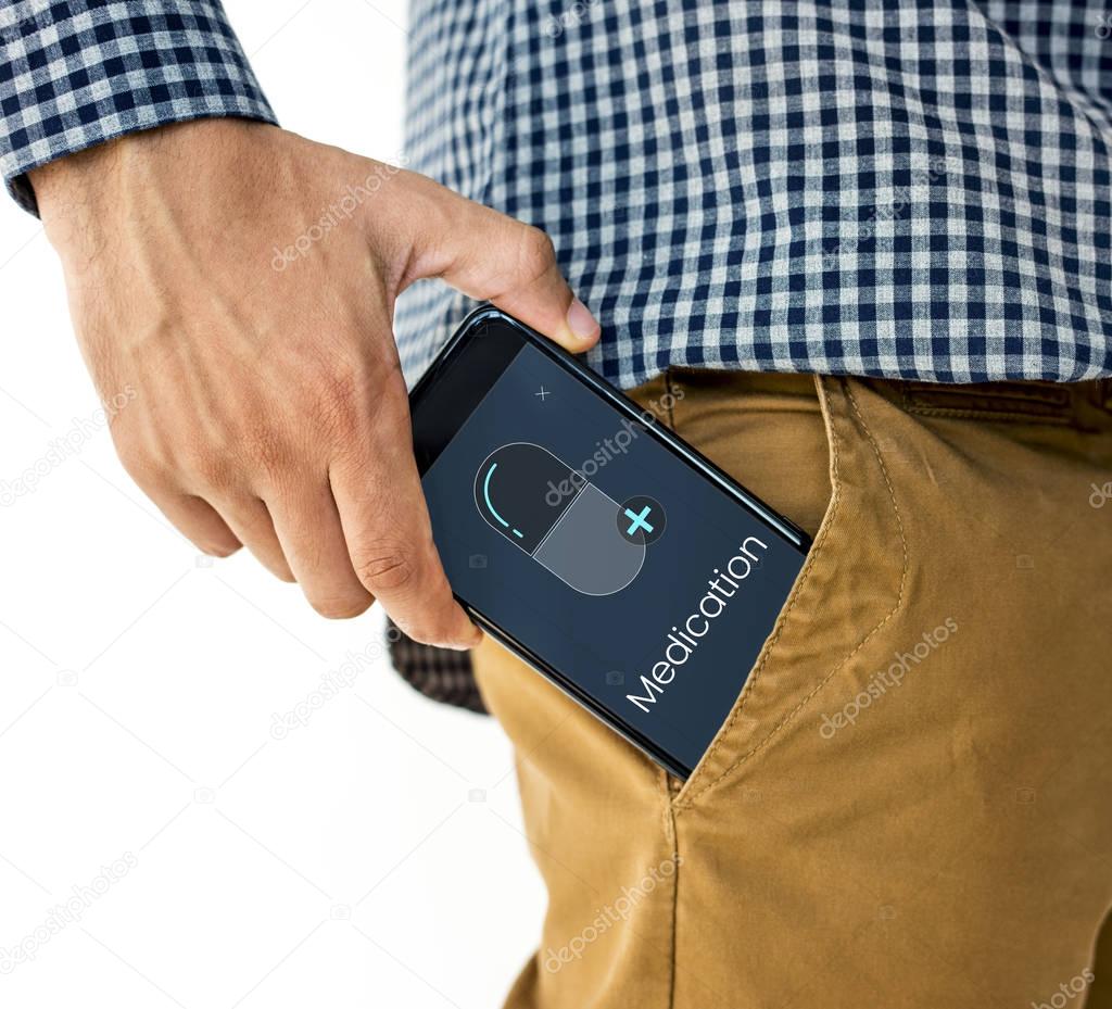 hand putting phone into pocket