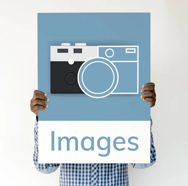 Person holding paper placard — Stock Photo, Image