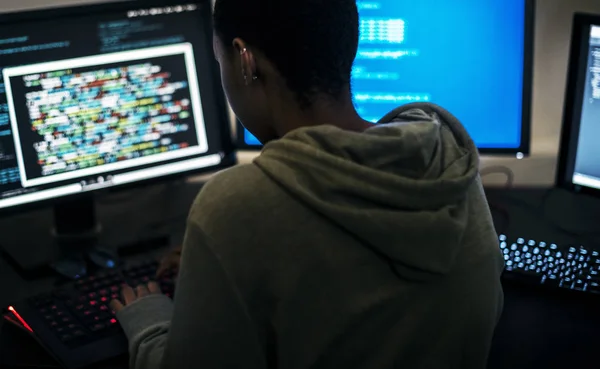 Hacker man working on computer — Stock Photo, Image