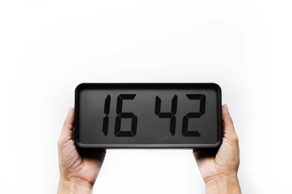 Digital clock in hands — Stock Photo, Image