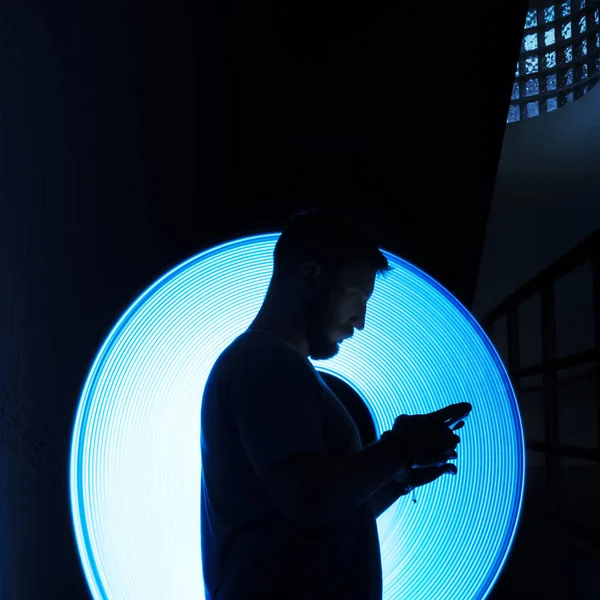 Closeup Man Using Mobile Phone Dark Long Exposure Light Original — Stock Photo, Image