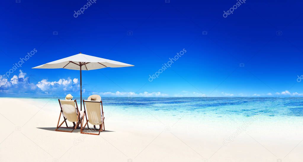 Couple relaxing at a beach
