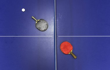 Rackets on a ping pong table, original photoset clipart
