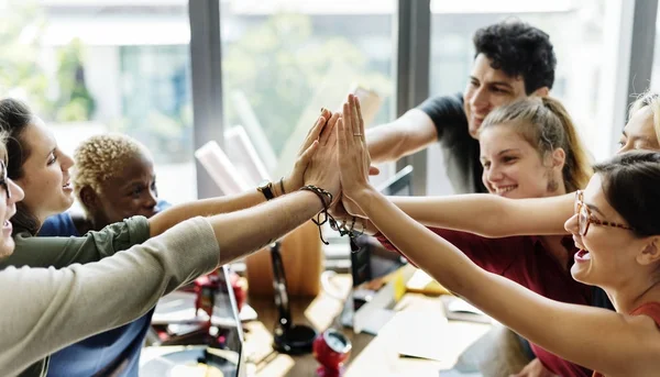 Business team holding hands — Stock Photo, Image