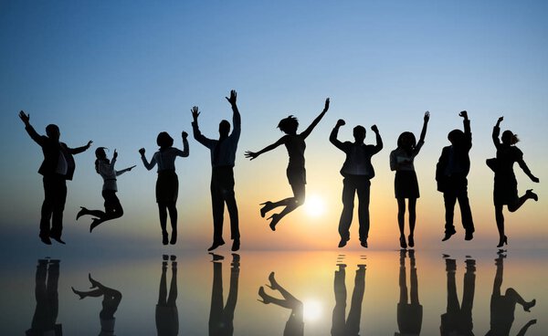 Successful business people celebrating