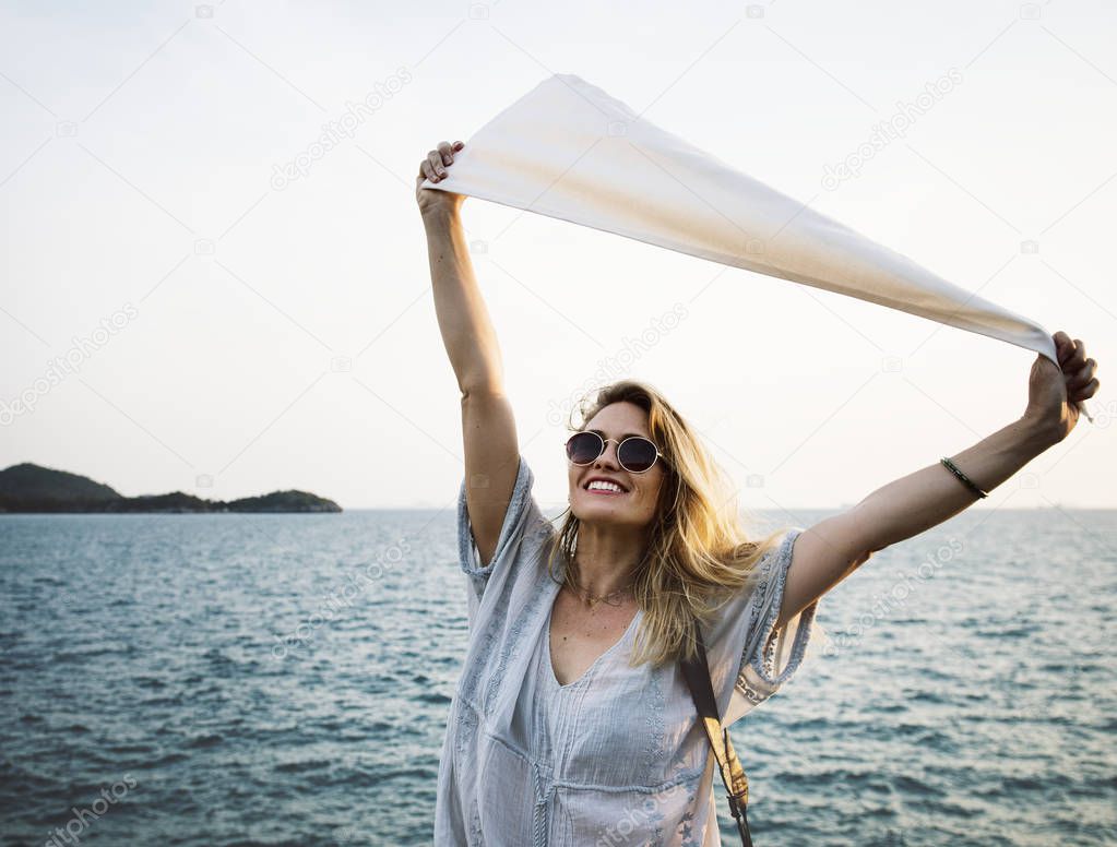 Woman smiling and chill out by the sea, original photoset