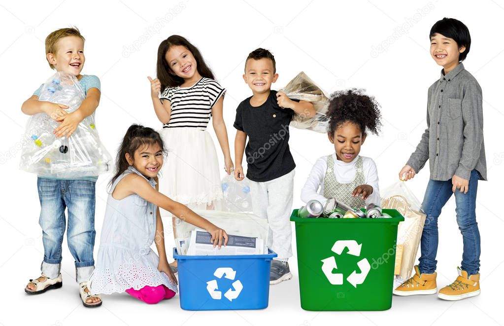 Group of adorable kids with waste for recycling