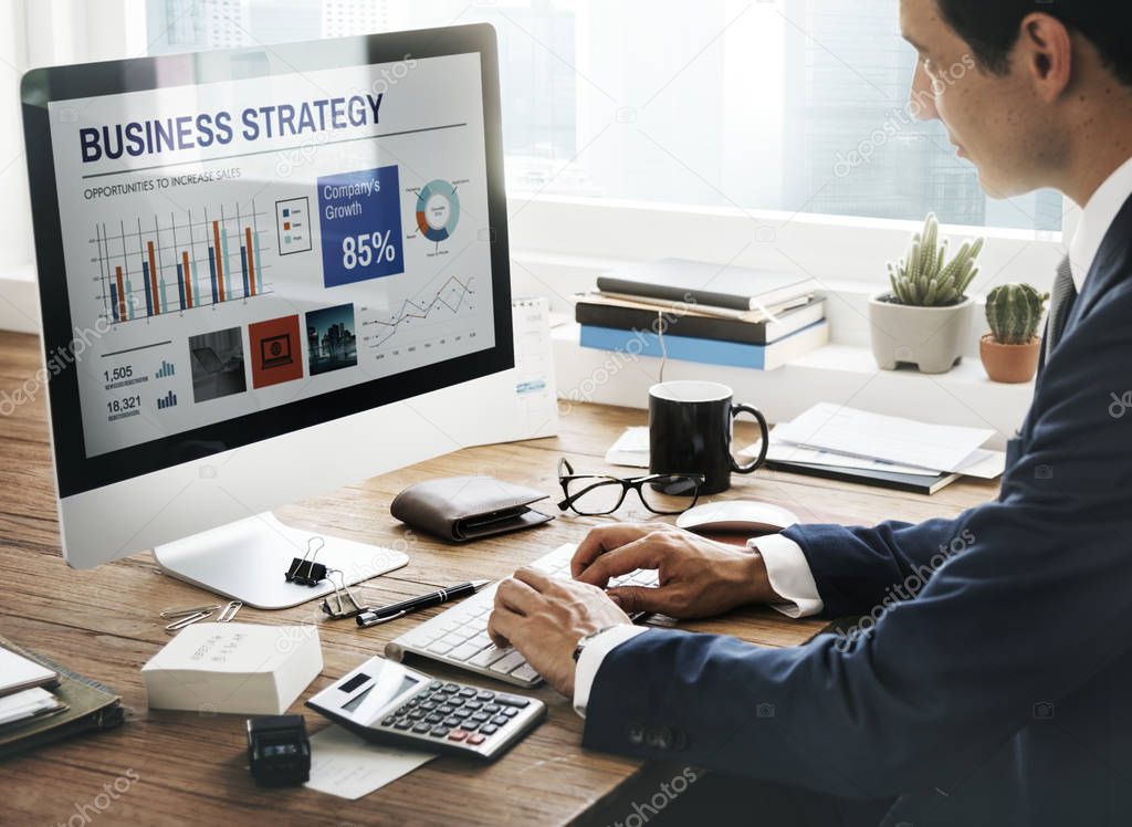 Businessman in suit using Computer  