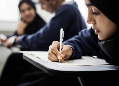 diverse muslim children studying in classroom, original photoset clipart
