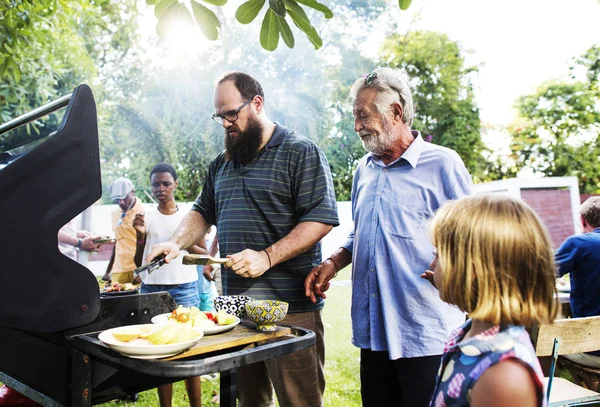 Diverse people enjoying barbecue party together, original photoset