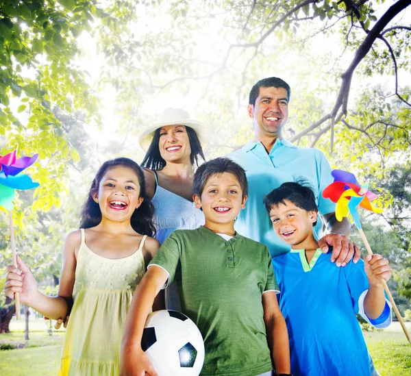 Portrait Happy Family Looking Camera While Standing Park — Stock Photo, Image