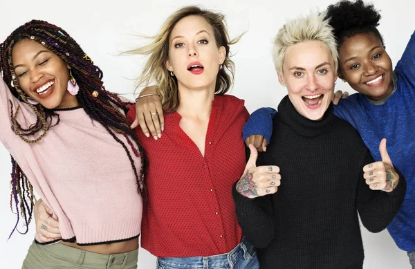 Four diversity women posing in studio, original photoset