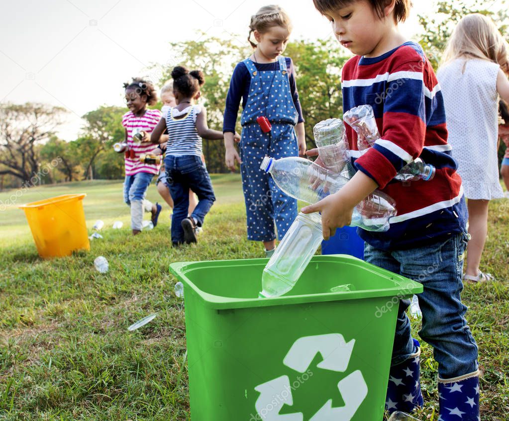 kids gathering plastic bottles