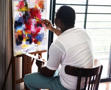 Onun sanat eseri yapan siyah sanatçı erkek orijinal photoset