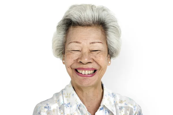 Senior asian woman posing in studio — Stock Photo, Image