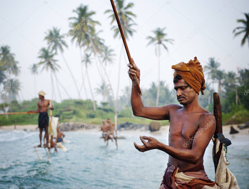 Traditional stilt fishermen in Sri Lanka.  Concept, original photoset