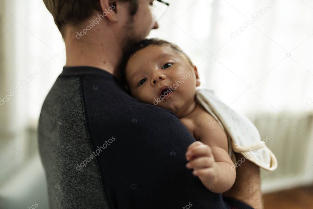 A newborn baby with father, original photoset