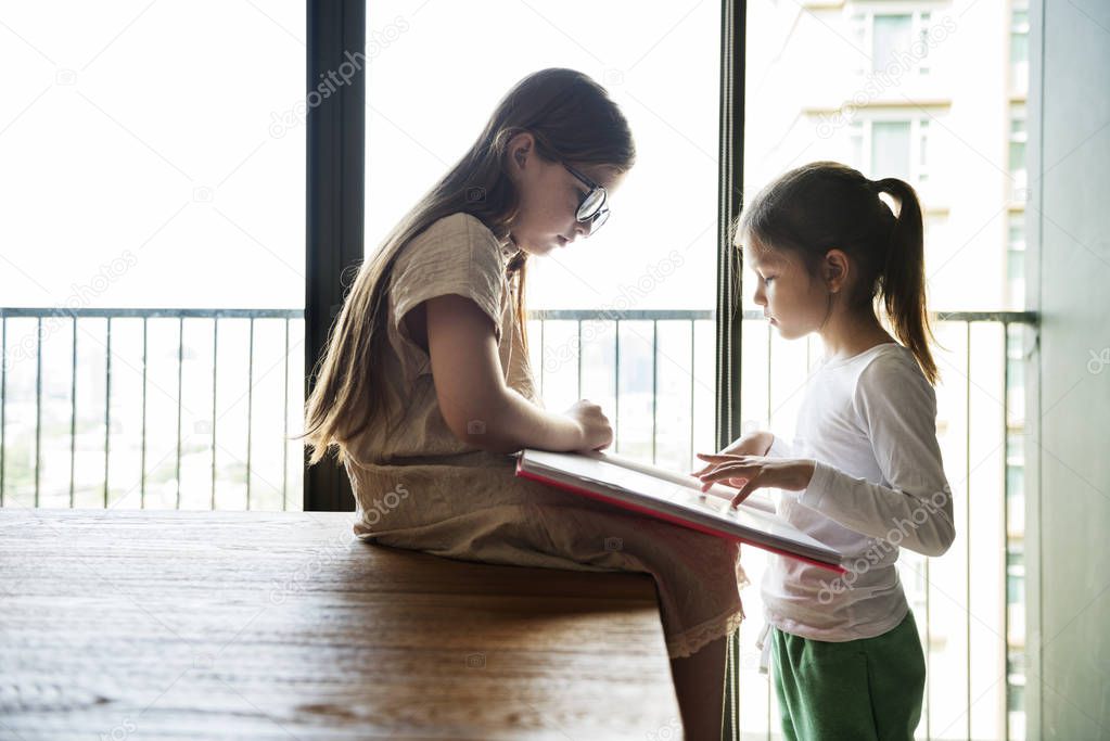 Two little girl reading book, original photoset