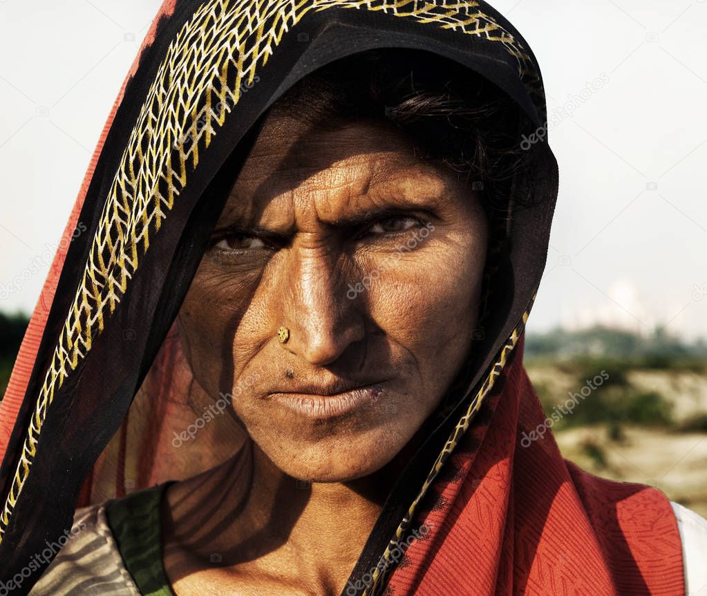 Indigenous Indian woman looking at the camera unhappily, original photoset