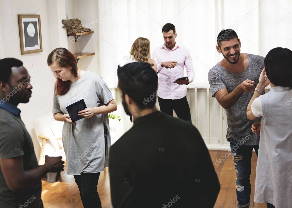 young people in art exhibition