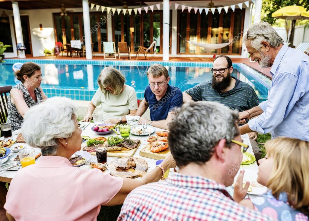 Group of diverse people enjoying barbecue party together, original photoset