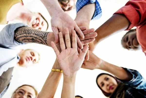 People holding hands together — Stock Photo, Image