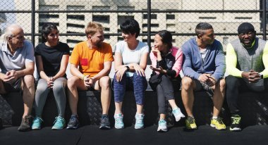 Grup birlikte, orijinal oturan farklı sporcuların photoset