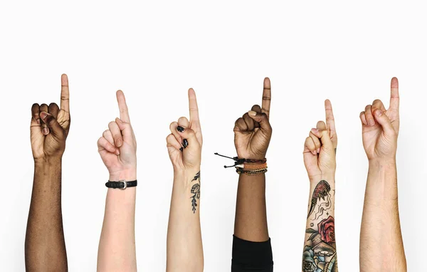 Imagem Cortada Pessoas Mãos Levantadas Apontando Dedo Para Cima — Fotografia de Stock