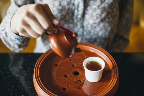 Woman Pouring Tea Cup — Stock Photo, Image