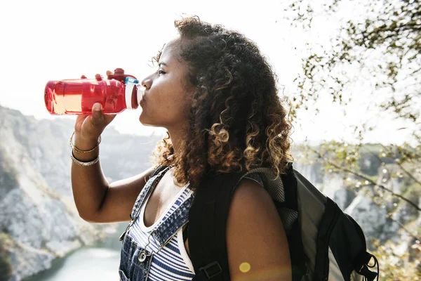 African Woman Traveler Drinking Water — Stock Photo, Image