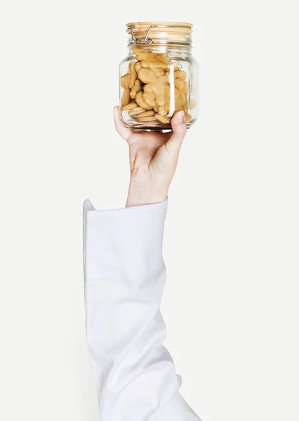 Mão Segurando Variação Biscoitos Frasco — Fotografia de Stock